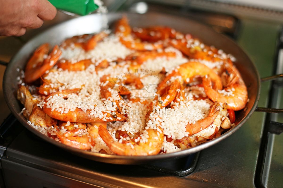 Paella Rice on a large flat pan
